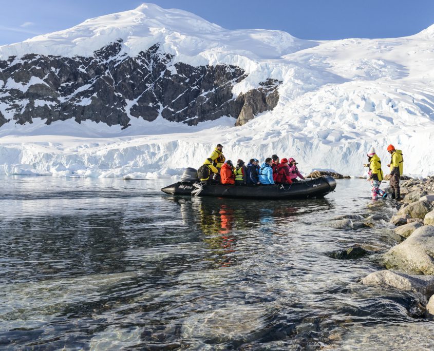 Zodiac approaching the landing site at Neko Harbour with the glacier in the background